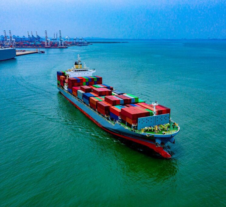 shipping boat moving containers across world and to new zealand
